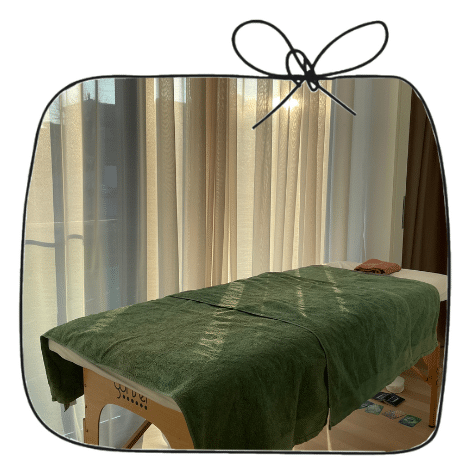 Massage après l'accouchement à domicile — Les Petits Pois Table de massage pour un massage après l'accouchement à domicile, région Lausanne et Vevey
